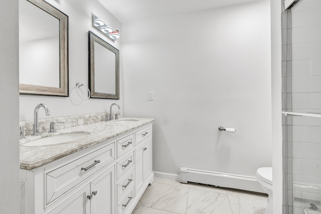 bathroom with dual vanity, tile patterned flooring, a baseboard heating unit, and toilet