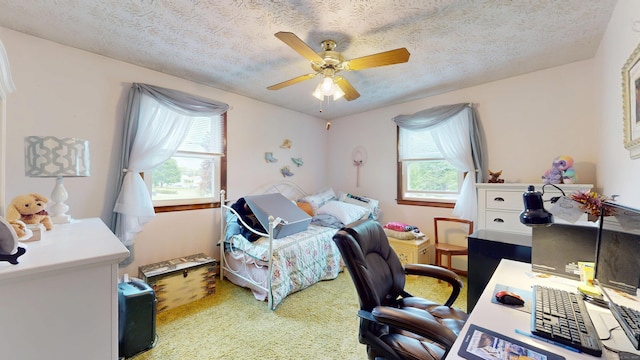 230 Unionville Ave, Plainville, CT 06062 - carpeted bedroom with an office area, a textured ceiling, and ceiling fan