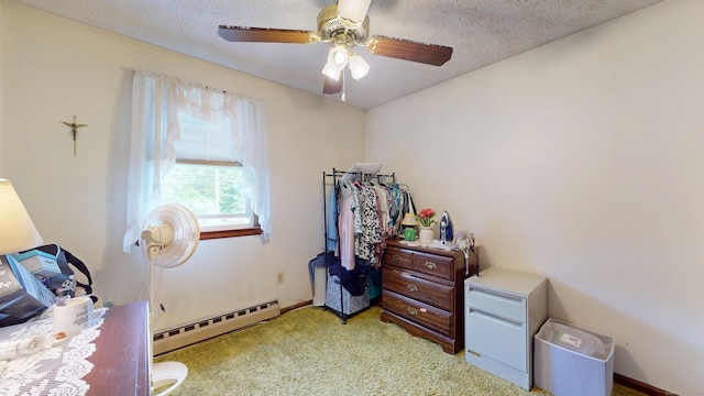230 Unionville Ave, Plainville, CT 06062 - carpeted bedroom featuring a baseboard radiator, ceiling fan, and a textured ceiling