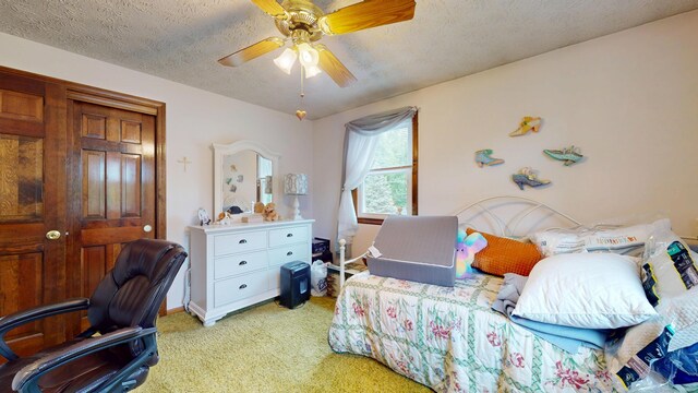 230 Unionville Ave, Plainville, CT 06062 - bedroom with light carpet, ceiling fan, and a textured ceiling
