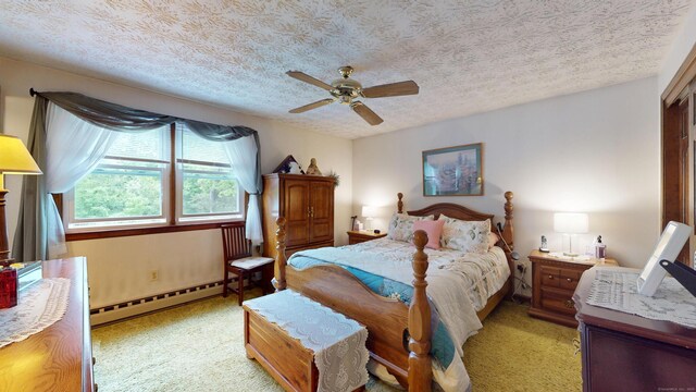 230 Unionville Ave, Plainville, CT 06062 - bedroom with a baseboard radiator, light carpet, a ceiling fan, and a textured ceiling