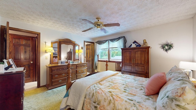 230 Unionville Ave, Plainville, CT 06062 - bedroom featuring light carpet, a textured ceiling, and a ceiling fan