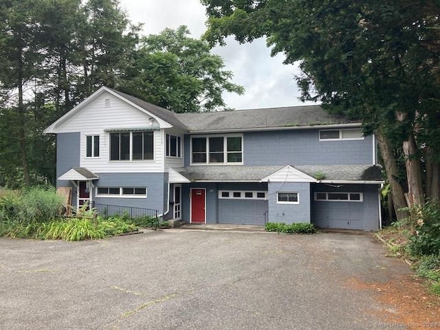 front facade with a garage