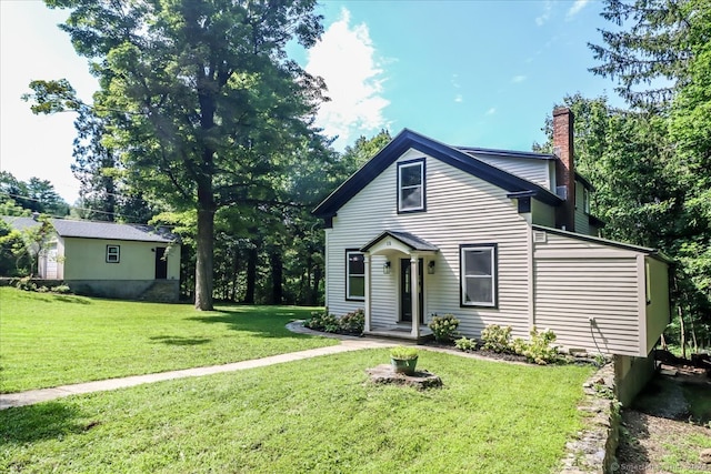 view of front of house with a front yard