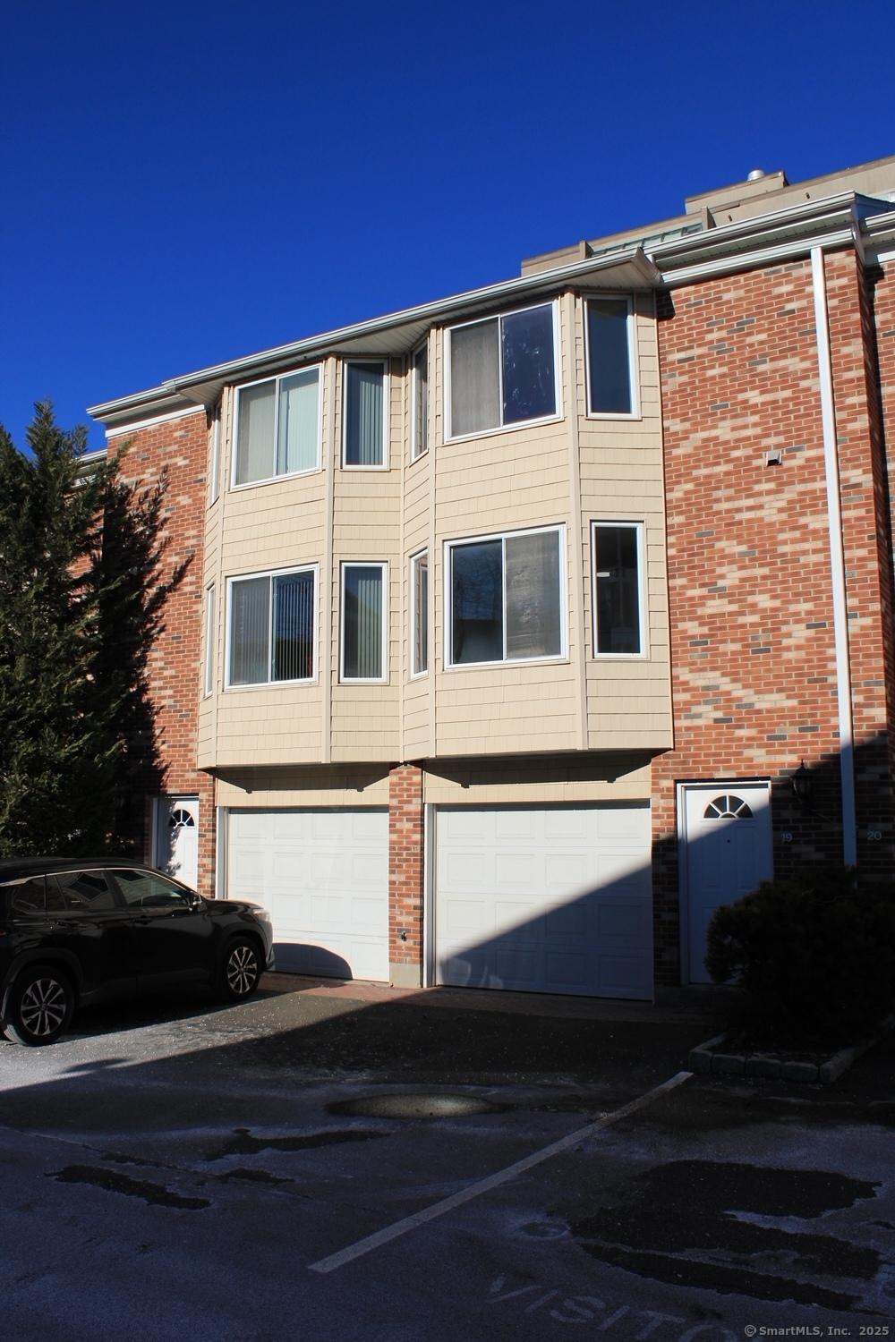 exterior space with a garage