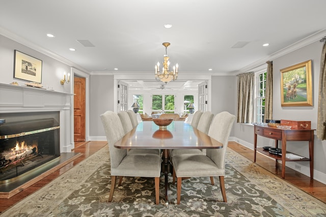 114 Ferris Hill Rd, New Canaan, CT 06840 - dining space with a chandelier, wood finished floors, baseboards, recessed lighting, and ornamental molding