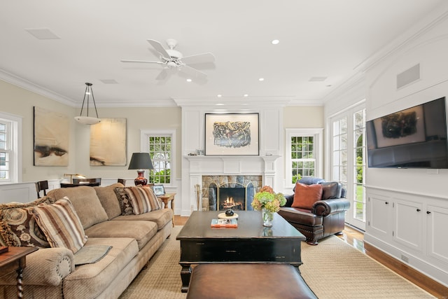 114 Ferris Hill Rd, New Canaan, CT 06840 - living room with wood finished floors, ceiling fan, ornamental molding, a fireplace, and recessed lighting