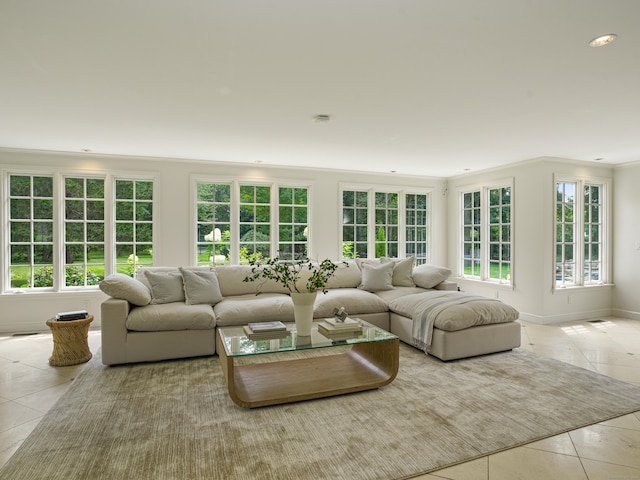 tiled living room featuring ornamental molding