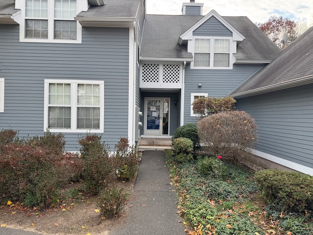 property entrance with a balcony