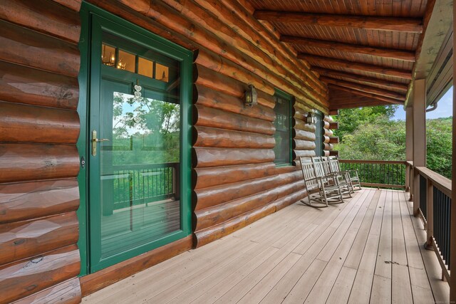 wooden deck featuring covered porch