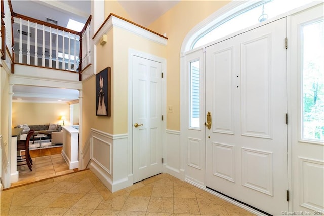 12 W Mountain Rd, Sharon, CT 06069 - foyer featuring wainscoting and a decorative wall