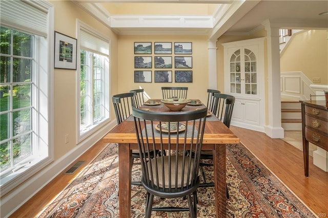 12 W Mountain Rd, Sharon, CT 06069 - dining space with light wood finished floors, plenty of natural light, visible vents, and ornamental molding