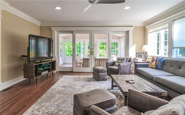 12 W Mountain Rd, Sharon, CT 06069 - living room with baseboards, wood finished floors, visible vents, and crown molding