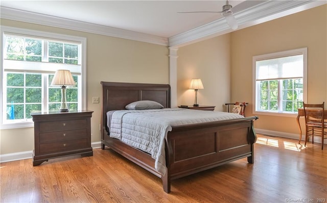 12 W Mountain Rd, Sharon, CT 06069 - bedroom with light wood-type flooring, ceiling fan, baseboards, and crown molding
