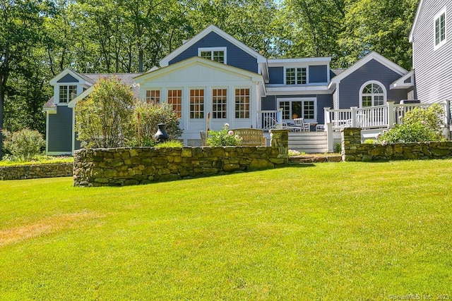 12 W Mountain Rd, Sharon, CT 06069 - back of property featuring a lawn and a wooden deck