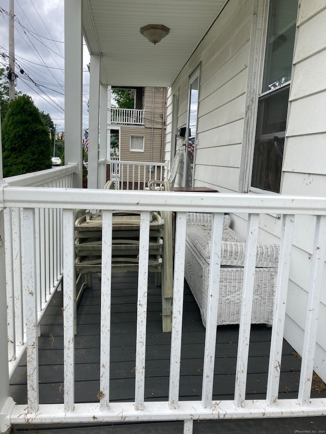 wooden terrace featuring a porch