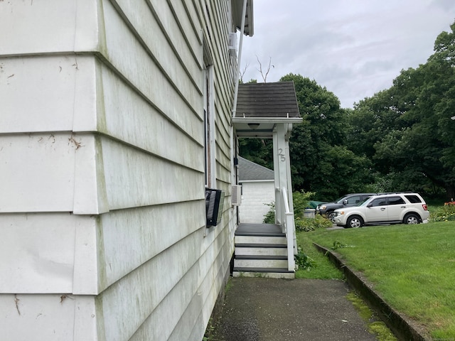 view of home's exterior featuring a lawn