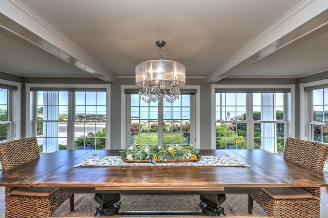 dining room featuring ornamental molding, a chandelier, and beam ceiling