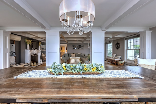 unfurnished dining area featuring dark wood-type flooring, beamed ceiling, crown molding, and an inviting chandelier