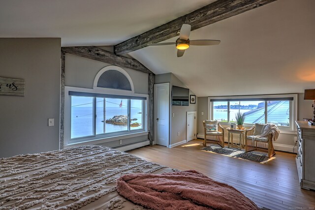 living room with lofted ceiling with beams, a baseboard radiator, hardwood / wood-style floors, and ceiling fan