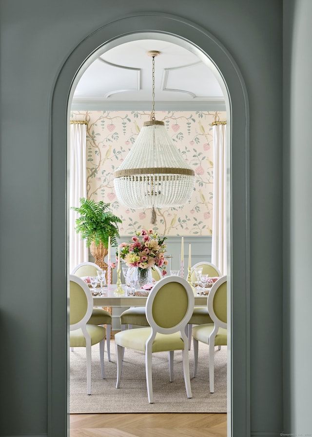 dining room featuring parquet floors