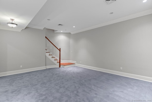 basement featuring ornamental molding and carpet floors