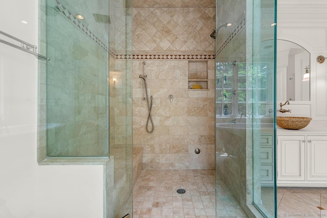 bathroom with vanity, walk in shower, and ornamental molding