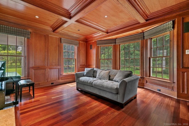 living room featuring dark hardwood / wood-style floors, ornamental molding, coffered ceiling, and wood ceiling