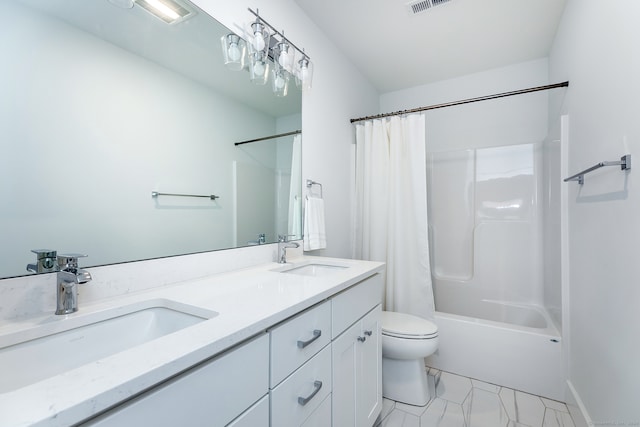 full bathroom with shower / tub combo with curtain, vanity, and toilet