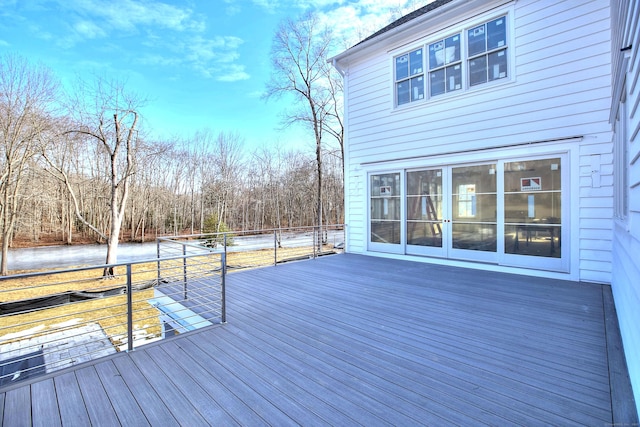 wooden terrace with a water view