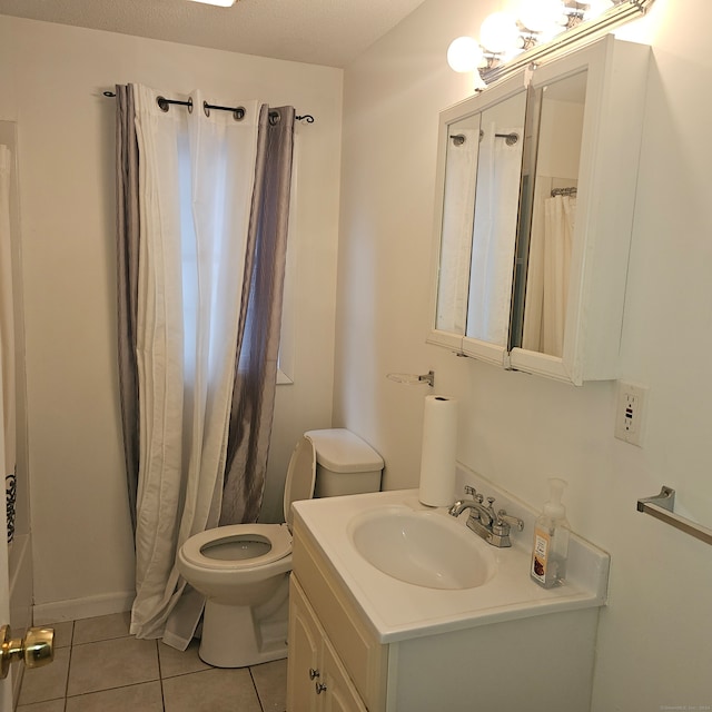 full bathroom featuring a textured ceiling, toilet, vanity, shower / tub combo with curtain, and tile patterned floors