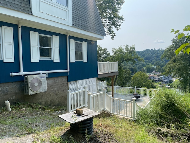 view of property exterior with ac unit