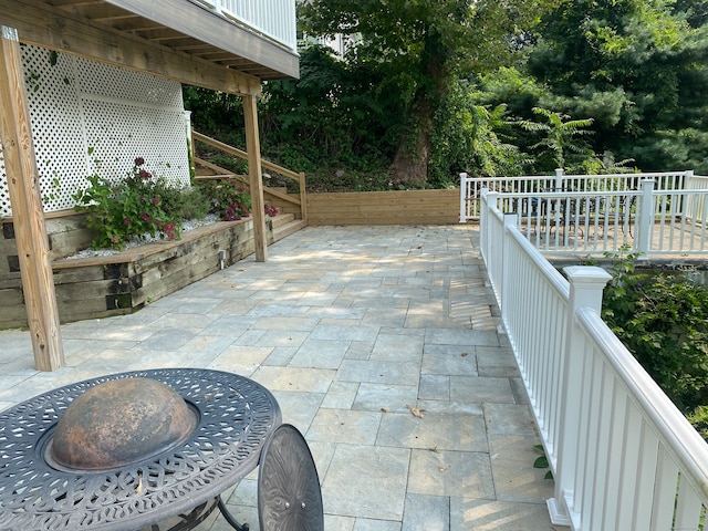 view of patio / terrace featuring a wooden deck