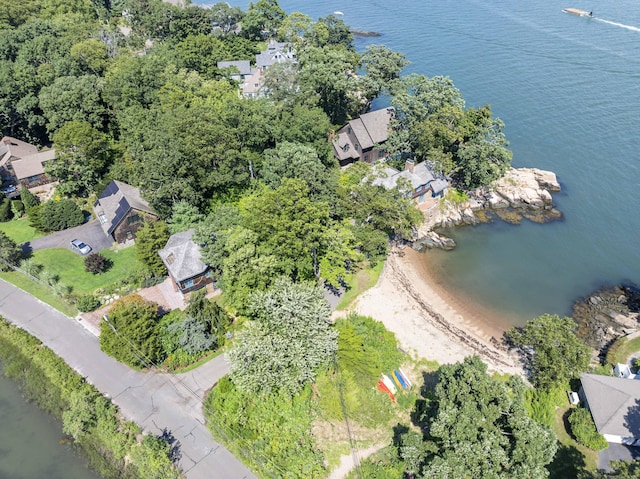 drone / aerial view featuring a water view and a residential view