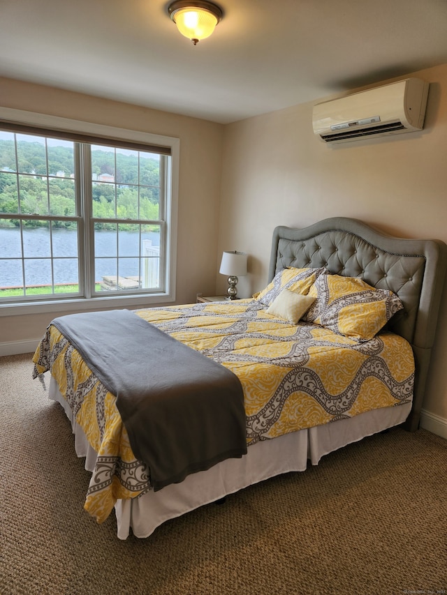 bedroom with carpet, multiple windows, and a wall mounted air conditioner