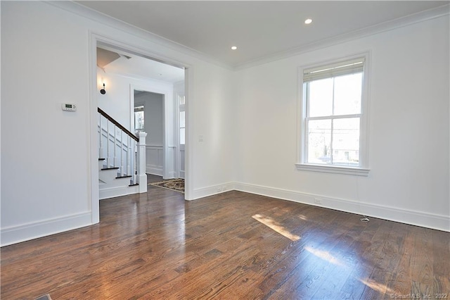 unfurnished room featuring crown molding and dark hardwood / wood-style flooring