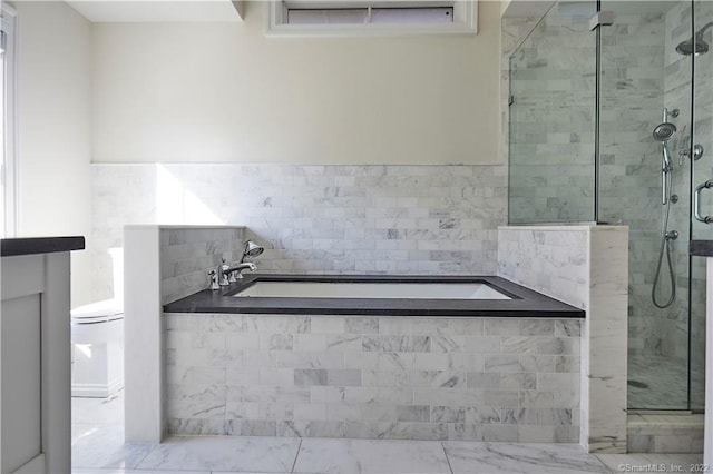 bathroom with tile patterned flooring and independent shower and bath