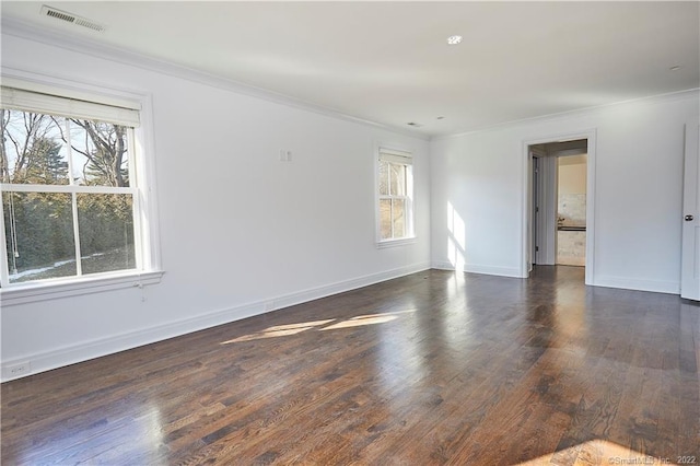 unfurnished room featuring crown molding and dark hardwood / wood-style floors