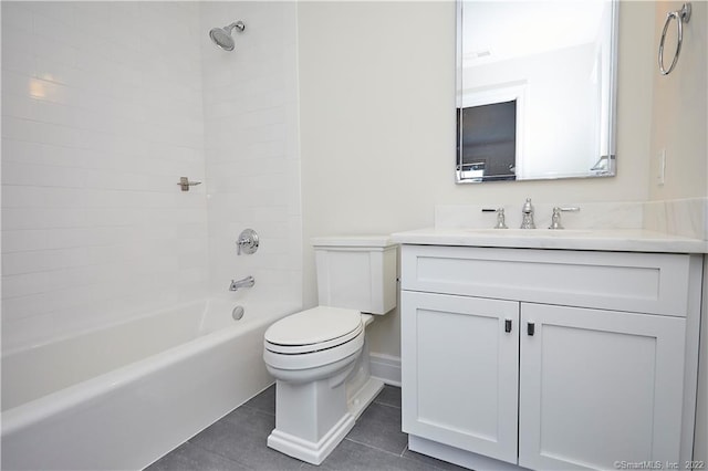 full bathroom featuring tile patterned floors, vanity, toilet, and shower / tub combination