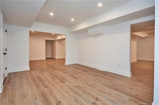 basement featuring light hardwood / wood-style floors