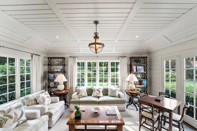 sunroom with wood ceiling and lofted ceiling