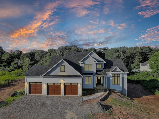 view of front of property with a garage