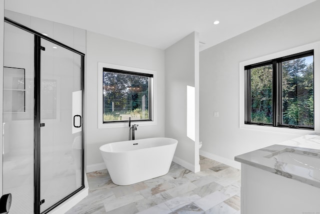 bathroom with tile patterned floors, plenty of natural light, and independent shower and bath