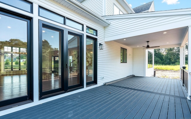 wooden terrace featuring ceiling fan and french doors