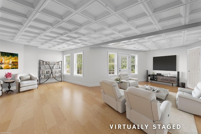 living room featuring a wealth of natural light, coffered ceiling, and light hardwood / wood-style floors