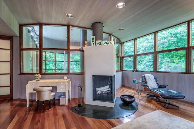 23 Mauwee Brook Way, Kent, CT 06757 - living room featuring a fireplace with flush hearth, plenty of natural light, wood finished floors, and recessed lighting
