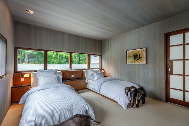 bedroom featuring light colored carpet