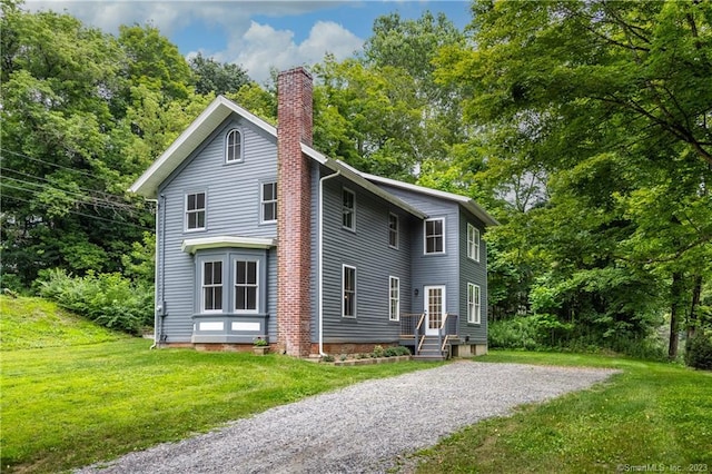 view of front of home with a front yard