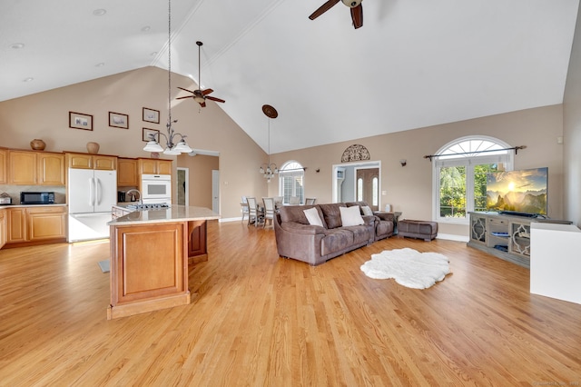 15 Huntington Ridge Rd, Wallingford, CT 06492 - living area featuring a ceiling fan, high vaulted ceiling, light wood-type flooring, and baseboards