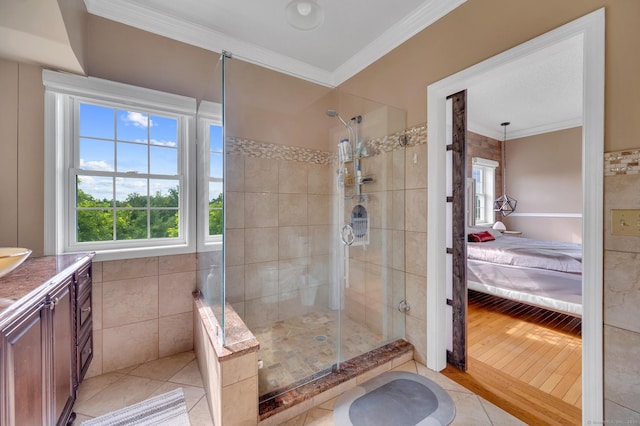 15 Huntington Ridge Rd, Wallingford, CT 06492 - ensuite bathroom featuring a shower stall, plenty of natural light, ornamental molding, vanity, and wood finished floors